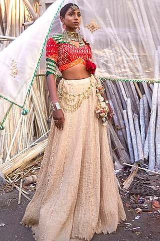 Beige Pochampally Raw Silk Ikat Fabric Handwork Lehenga Set by Muskann Kapadiaa