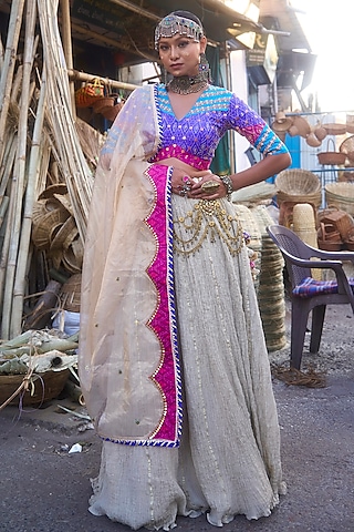 Beige Pochampally Raw Silk Ikat Fabric Handwork Lehenga Set by Muskann Kapadiaa