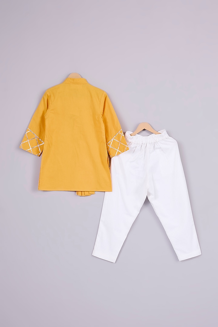 Yellow Linen Asymmetrical Criss-Cross Kurta Set For Boys by Mulyo Kids at Pernia's Pop Up Shop