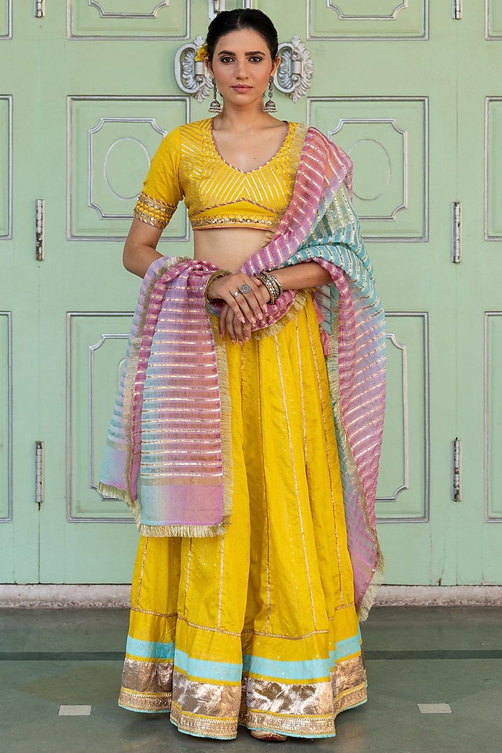 Yellow Embellished Lehenga Set by Myaara