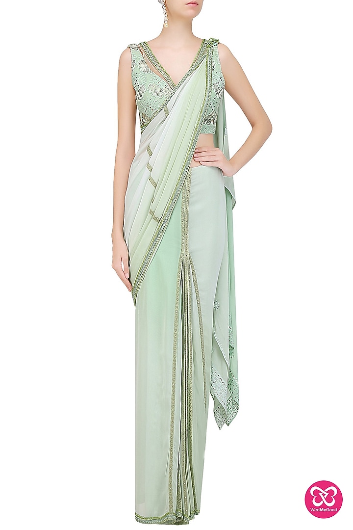 Pastel green mukaish embroidered saree with blouse available only at Pernia's Pop Up Shop.