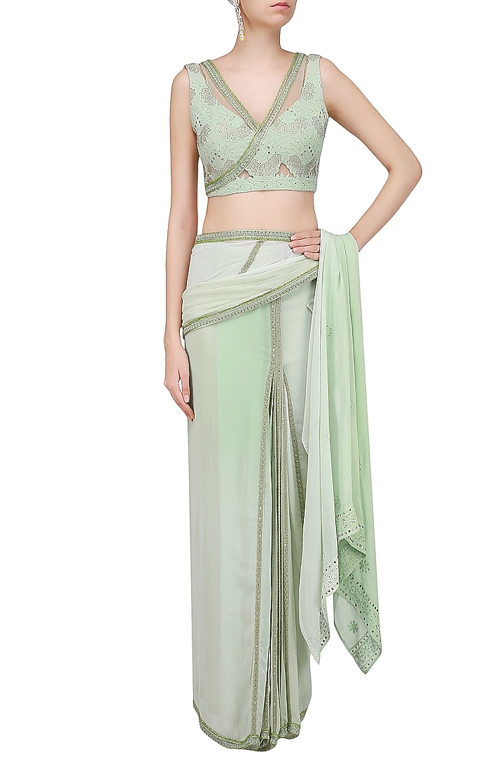 Pastel green mukaish embroidered saree with blouse available only at Pernia's Pop Up Shop.