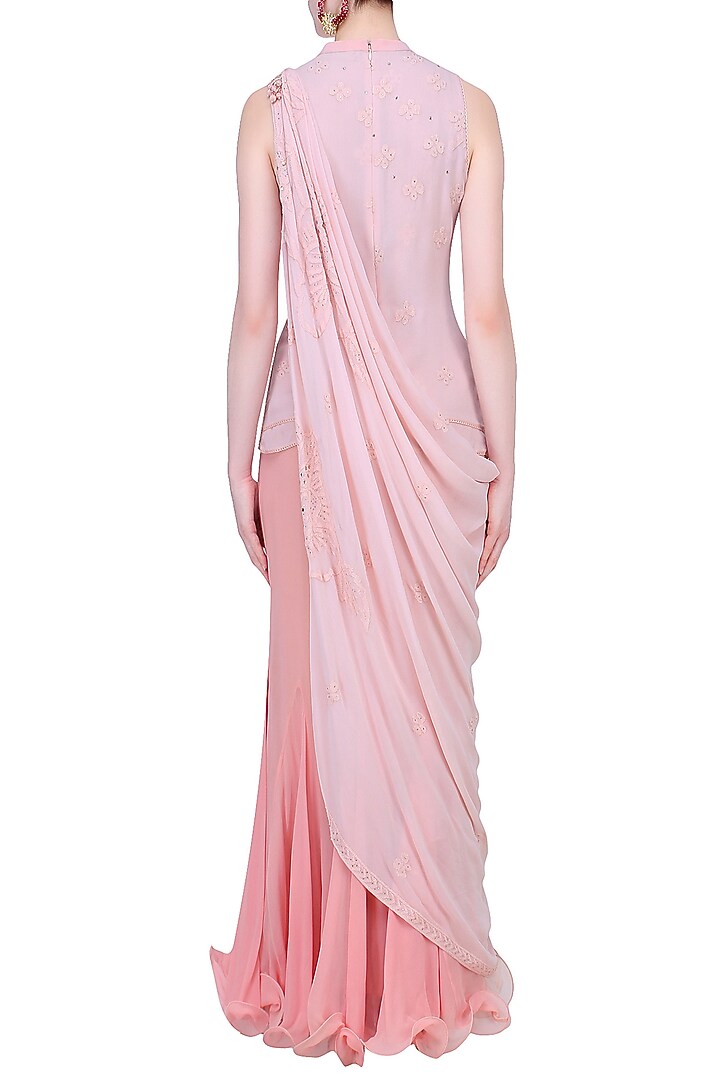 Light pink mukaish embroidered lehenga set available only at Pernia's Pop Up Shop.