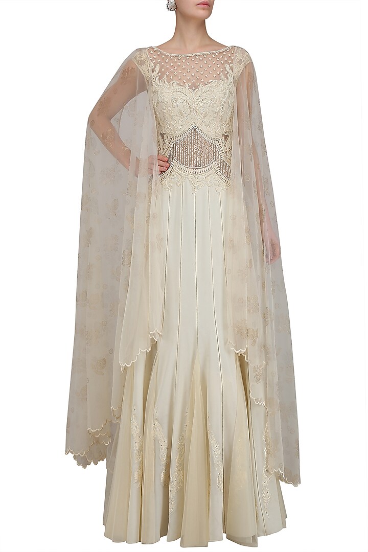 Ivory beaded nouveau dress with attached back net cape available only at Pernia's Pop Up Shop.