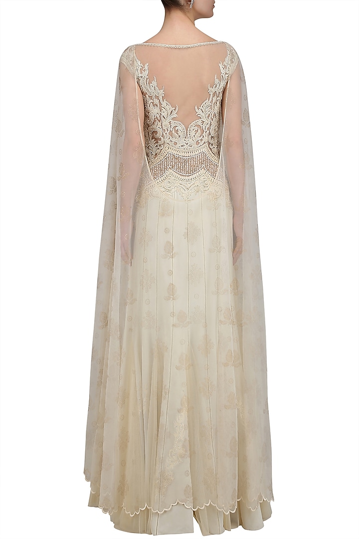 Ivory beaded nouveau dress with attached back net cape available only at Pernia's Pop Up Shop.