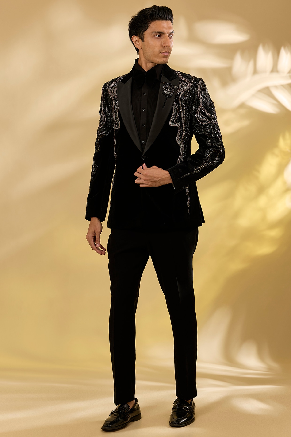 Black Italian Fabric Cutdana Hand Embroidered Tuxedo Set by Mayank