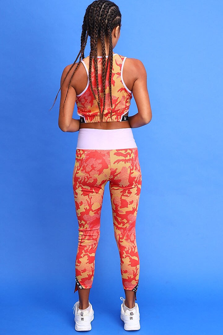 Orange Sports Leggings by Myriad at Pernia's Pop Up Shop