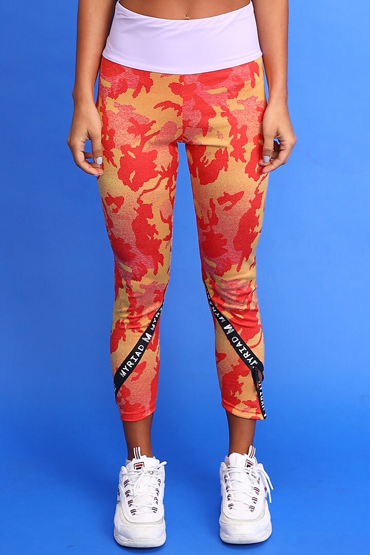 Orange Sports Leggings by Myriad at Pernia's Pop Up Shop