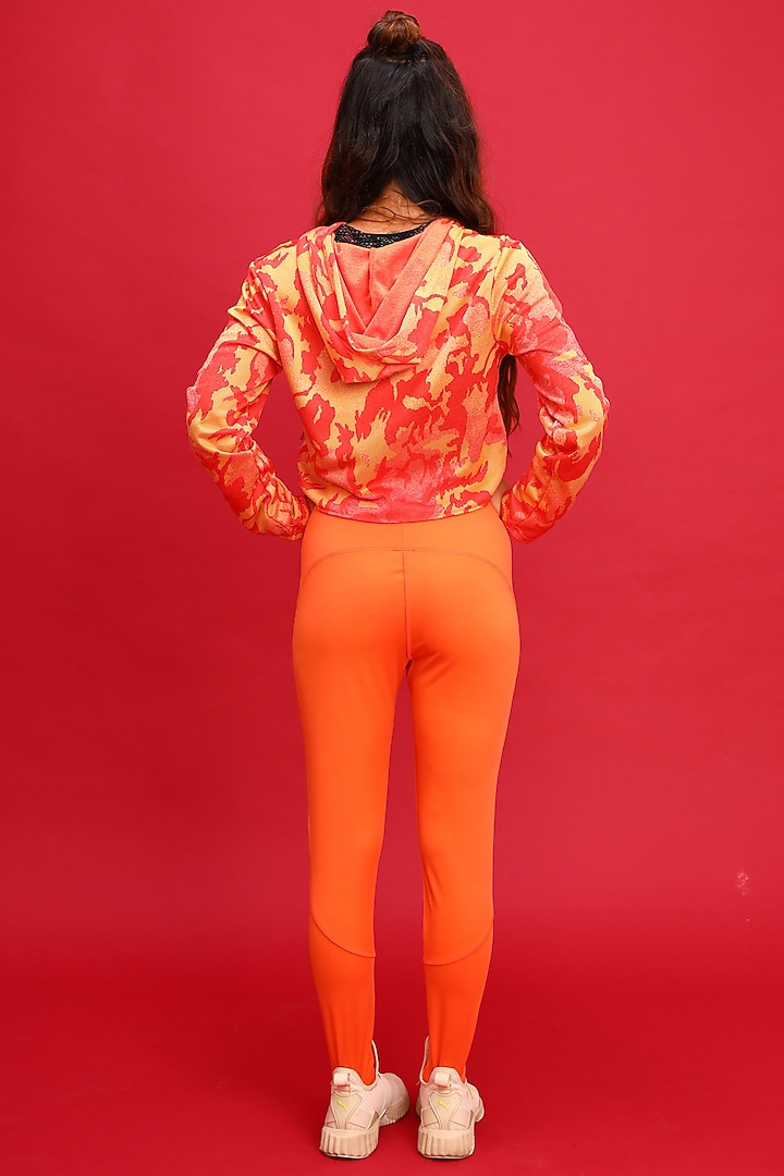Orange Sports Leggings by Myriad at Pernia's Pop Up Shop
