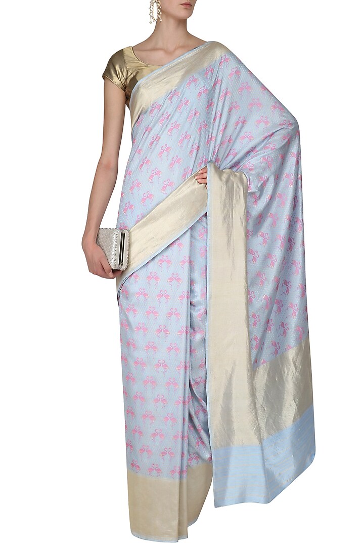 Powder blue and pink flamingoes benarasi saree available only at Pernia's Pop Up Shop.