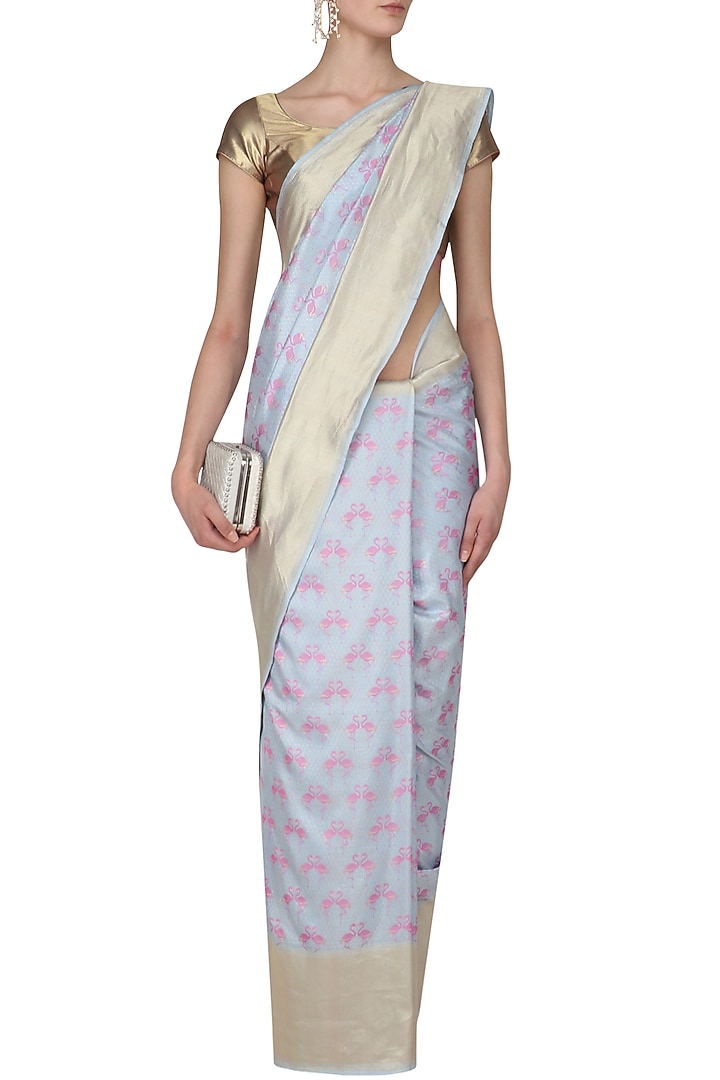 Powder blue and pink flamingoes benarasi saree available only at Pernia's Pop Up Shop.