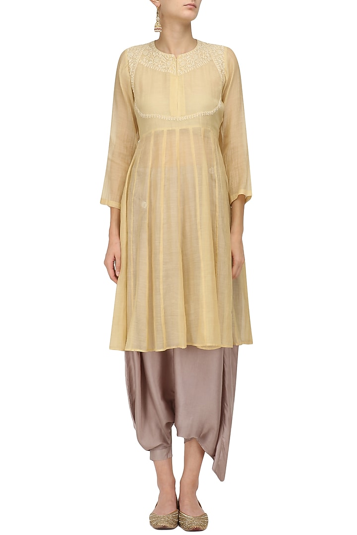 Yellow chikankari kurta and pant skirt set available only at Pernia's Pop Up Shop.