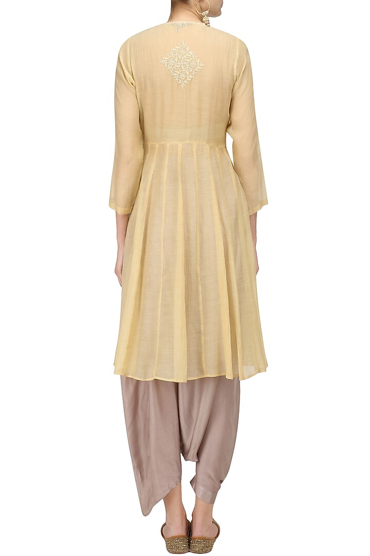 Yellow chikankari kurta and pant skirt set available only at Pernia's Pop Up Shop.