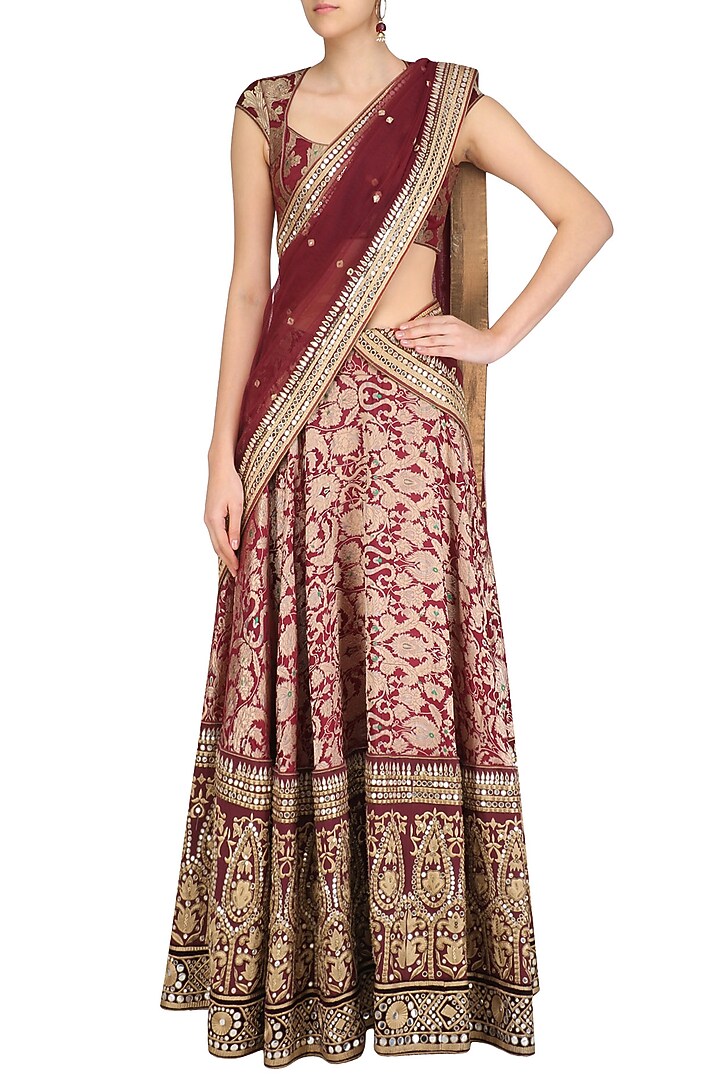 Maroon and gold gota patti banarasi brocade lehenga set available only at Pernia's Pop Up Shop.