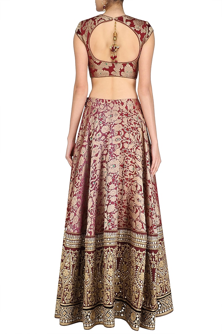 Maroon and gold gota patti banarasi brocade lehenga set available only at Pernia's Pop Up Shop.