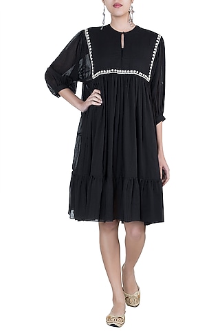 Black embroidered tier dress by Myoho