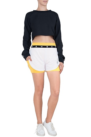 White elastic shorts by Myriad