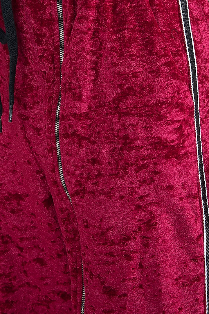 Red velvet track pants available only at Pernia's Pop Up Shop.