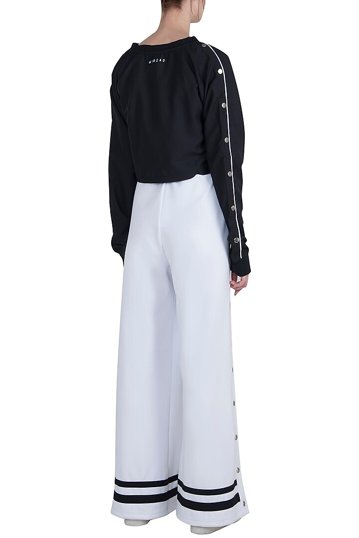 White leg cut statement pants available only at Pernia's Pop Up Shop.