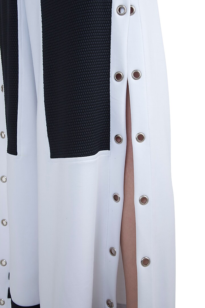 White leg cut statement pants available only at Pernia's Pop Up Shop.