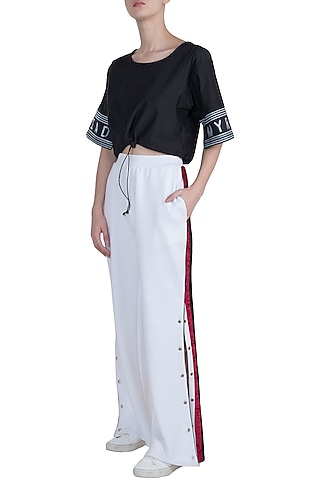 White wide cut pants by MYRIAD
