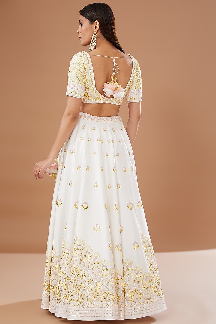 Ivory Dupion Silk Bridal Lehenga Set by MADZIN at Pernia's Pop Up Shop