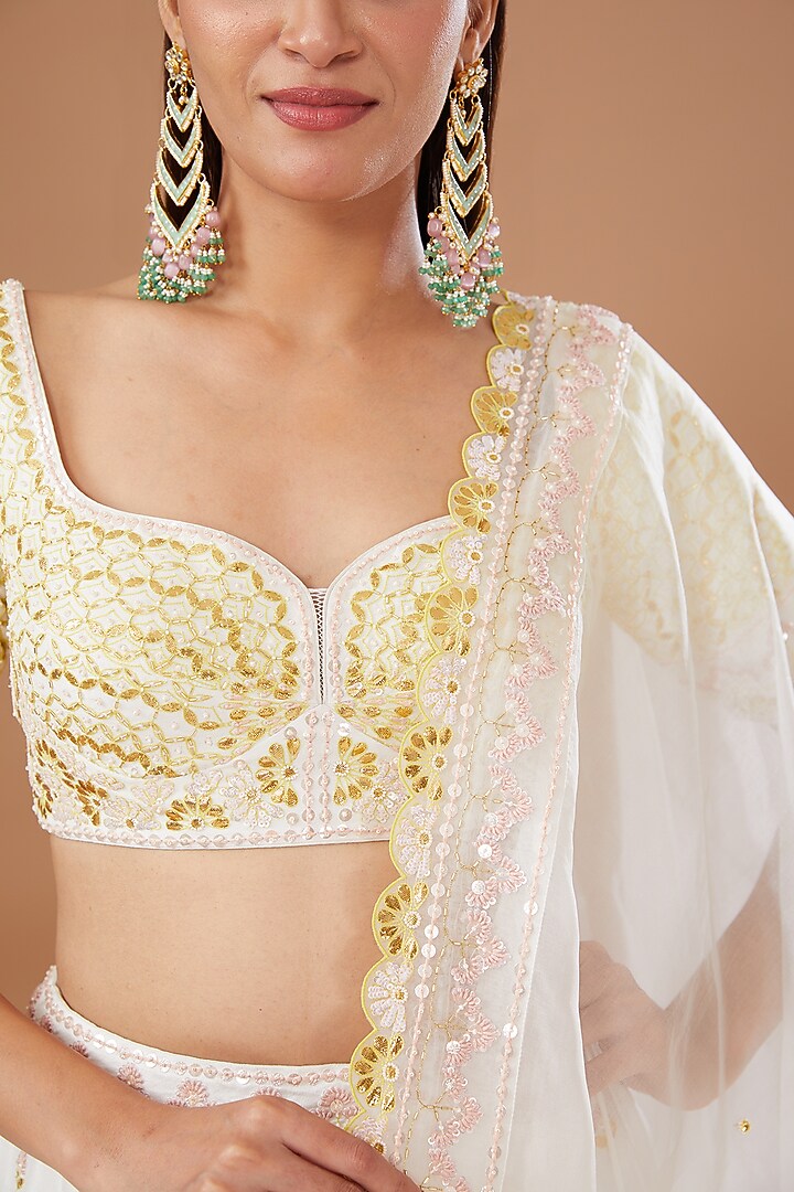 Ivory Dupion Silk Bridal Lehenga Set by MADZIN at Pernia's Pop Up Shop