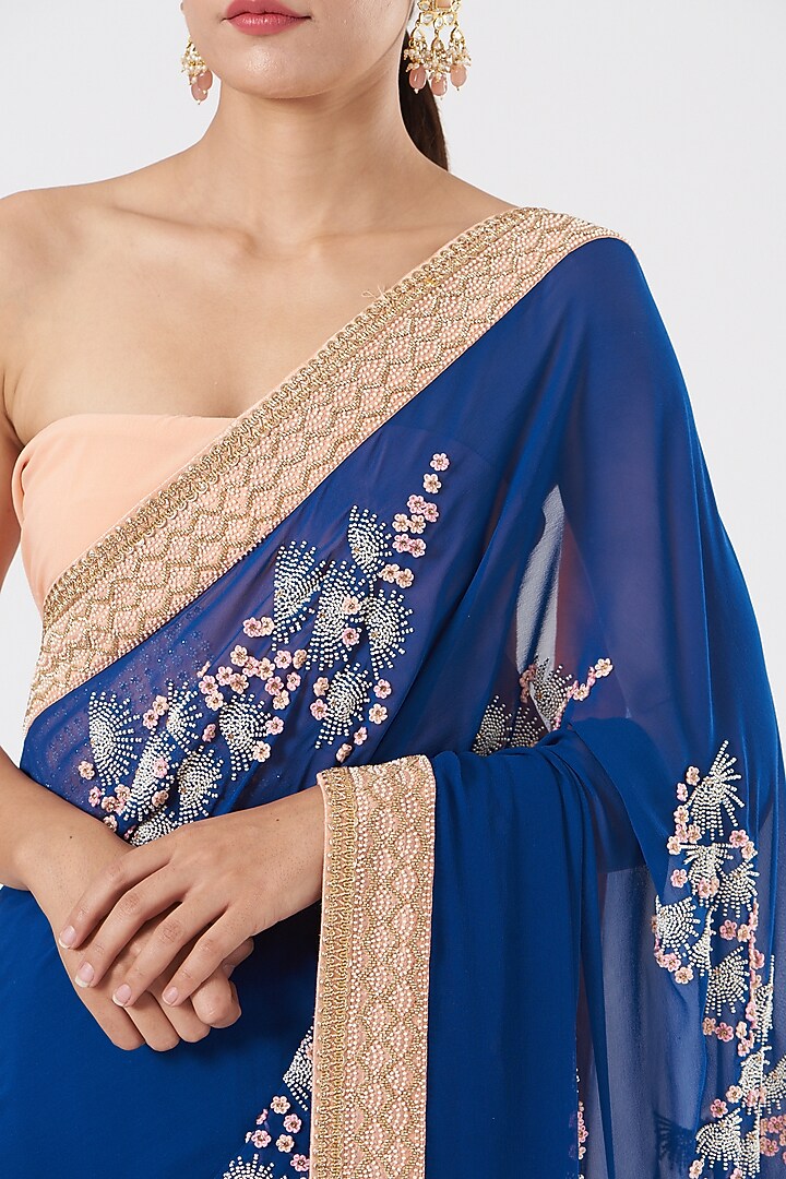 Blue Aari Embroidered Reception Saree by MADZIN at Pernia's Pop Up Shop