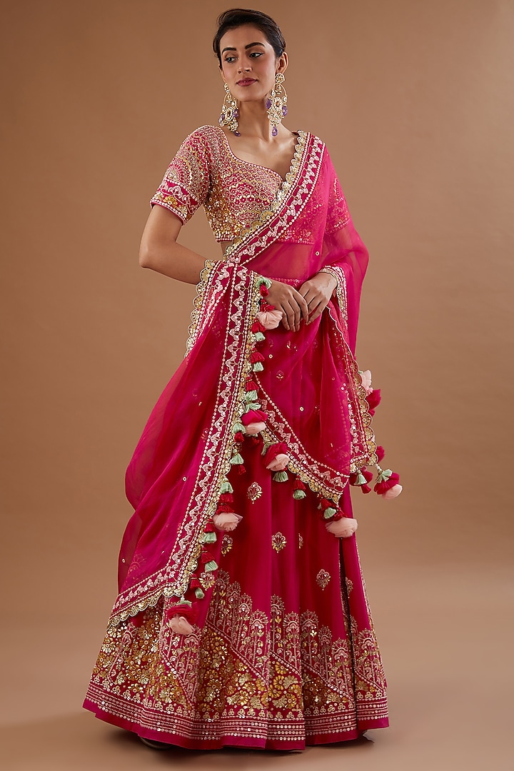 Red Dupion Silk Hand Embroidered Bridal Lehenga Set by MADZIN at Pernia's Pop Up Shop