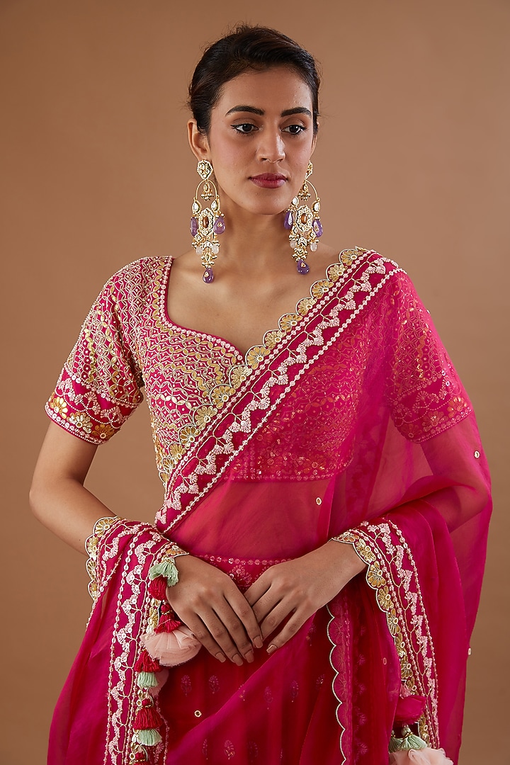 Red Dupion Silk Hand Embroidered Bridal Lehenga Set by MADZIN at Pernia's Pop Up Shop