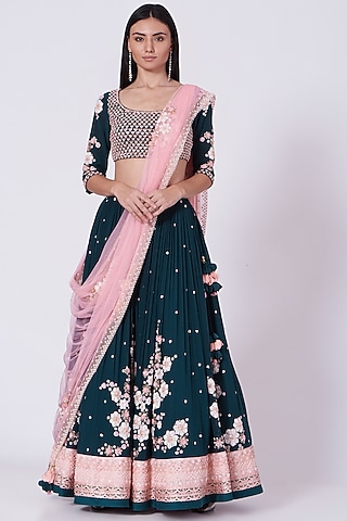 Bluish Green Embroidered Lehenga Set by MADZIN