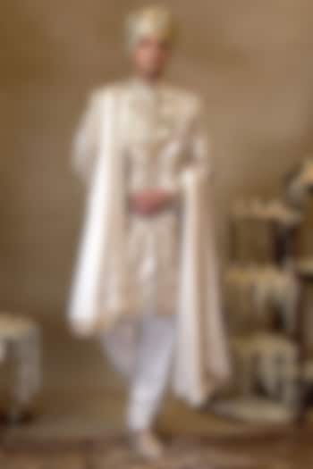 Ivory Silk Embroidered Sherwani Set by NAMAN AHUJA