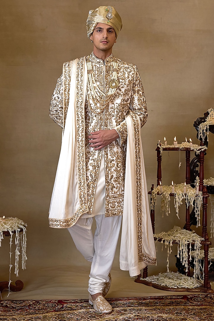 Ivory Silk Embroidered Sherwani Set by NAMAN AHUJA