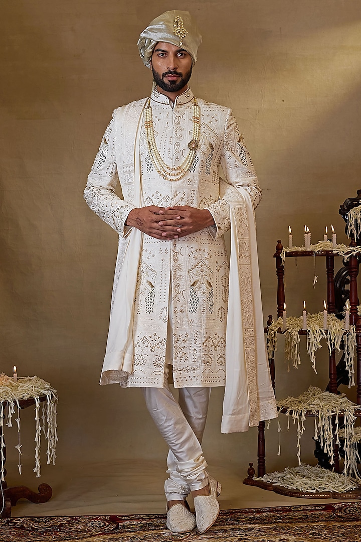 Ivory Silk Embroidered Sherwani Set by NAMAN AHUJA