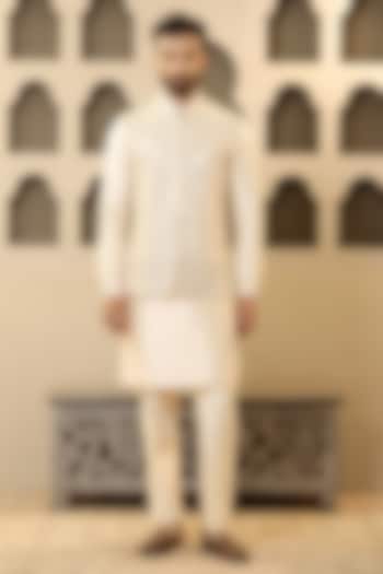 Peach Dupion Silk Mirror Work Bundi Jacket Set by NAMAN AHUJA at Pernia's Pop Up Shop