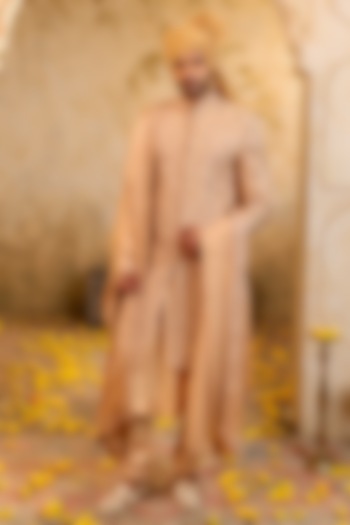 Buff Gold Raw Silk Embroidered Groom Sherwani Set by NAMAN AHUJA at Pernia's Pop Up Shop