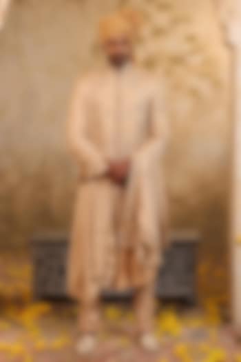 Champagne Gold Raw Silk Embroidered Groom Sherwani Set by NAMAN AHUJA at Pernia's Pop Up Shop