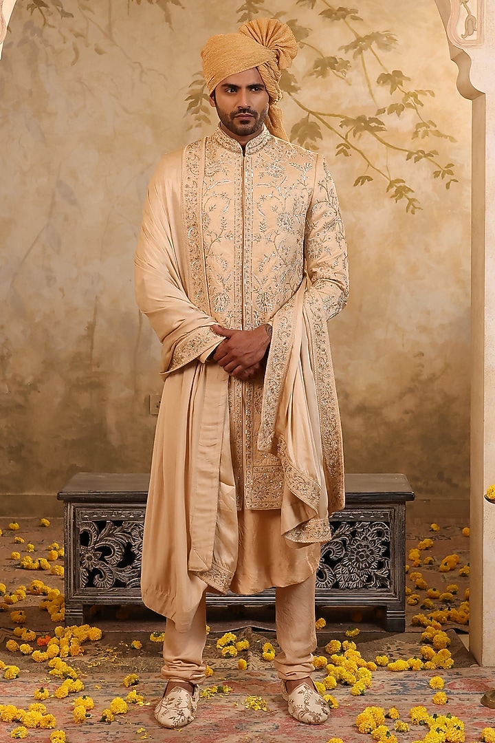 Champagne Gold Raw Silk Embroidered Groom Sherwani Set by NAMAN AHUJA at Pernia's Pop Up Shop
