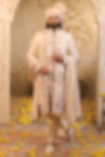 Soft Peach Raw Silk Embroidered Groom Sherwani Set by NAMAN AHUJA at Pernia's Pop Up Shop