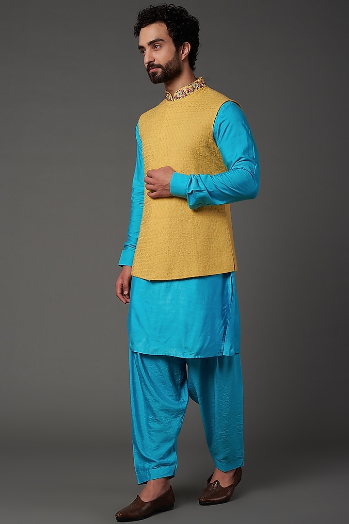 Yellow Embroidered Bundi Jacket With Blue Kurta Set by NAMAN AHUJA