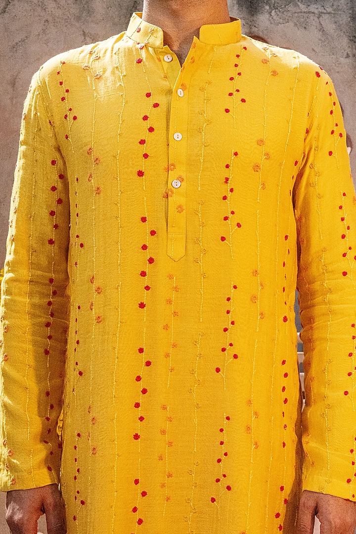 Yellow Chanderi & Tussar Silk Floral Work Kurta Set by NAFS at Pernia's Pop Up Shop