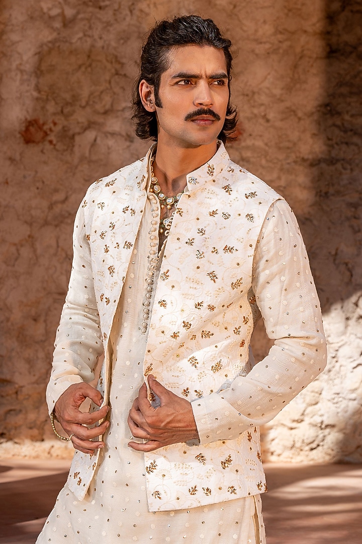 Ivory Chanderi Floral Embroidered Bundi Jacket Set by NAFS at Pernia's Pop Up Shop