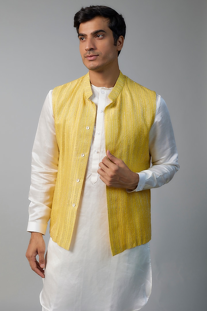 Yellow Linen Satin Zari Embroidered Bundi Jacket Set by NAFS at Pernia's Pop Up Shop
