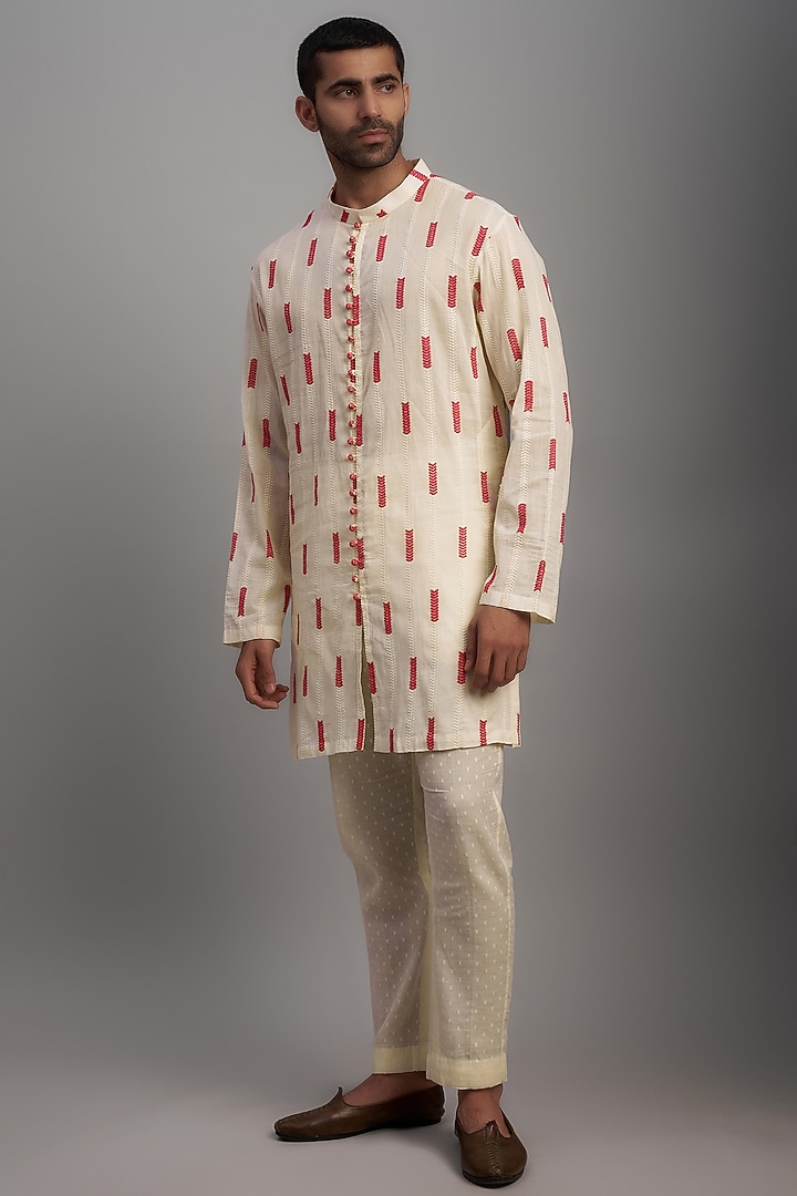 Ivory Cotton Embroidered Kurta Set by NAFS at Pernia's Pop Up Shop