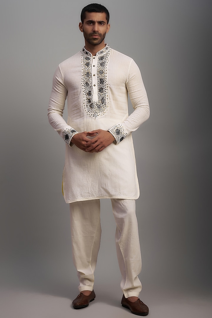 Ivory Kora Cotton Hand Embroidered Kurta Set by NAFS