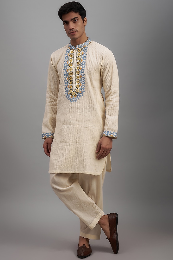 Off-White Mulmul Cotton Embroidered Kurta Set by NAFS at Pernia's Pop Up Shop