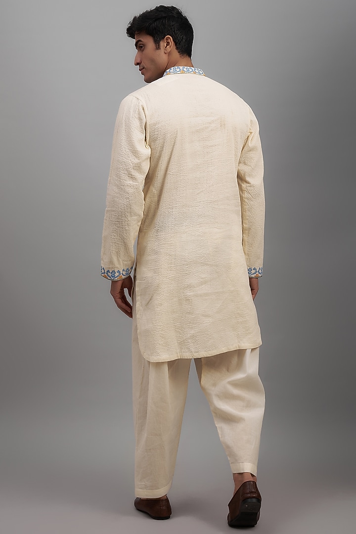 Off-White Mulmul Cotton Embroidered Kurta Set by NAFS at Pernia's Pop Up Shop