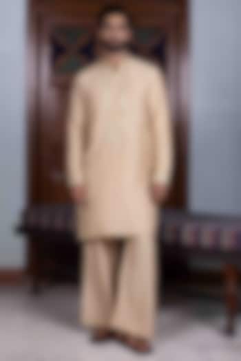 Sand Beige Tussar Silk Mirror Work Kurta Set by NAFS at Pernia's Pop Up Shop