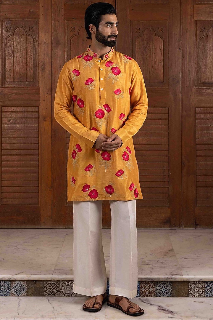 Yellow Tussar Silk Floral Thread Embroidered Kurta Set by NAFS at Pernia's Pop Up Shop