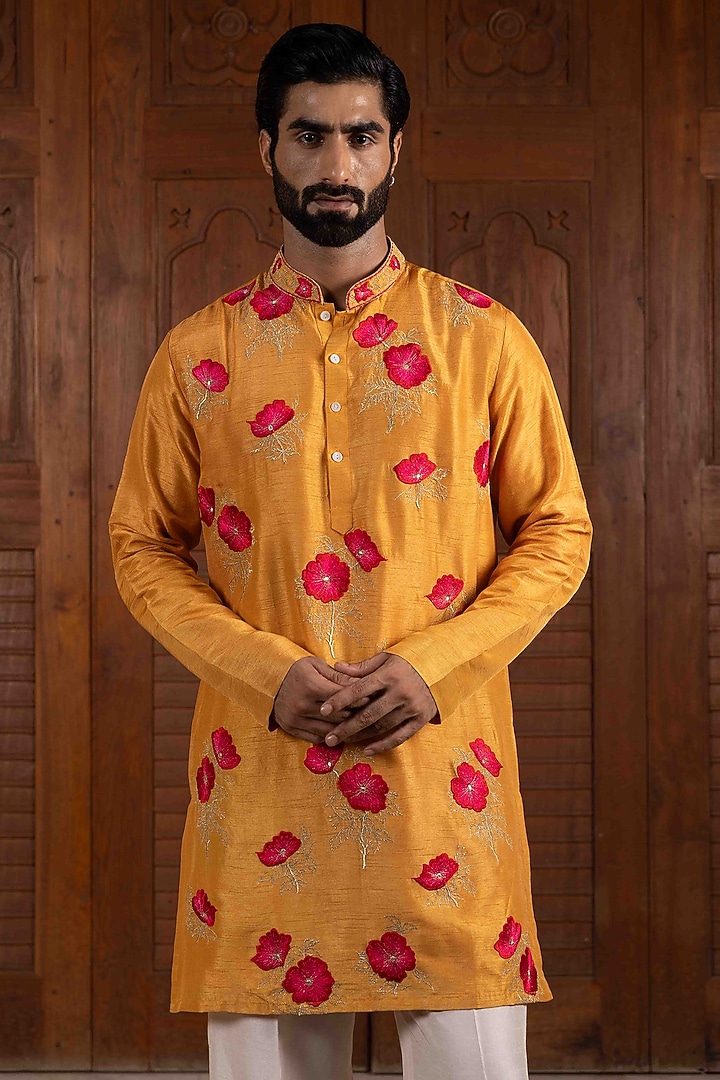 Yellow Tussar Silk Floral Thread Embroidered Kurta Set by NAFS at Pernia's Pop Up Shop